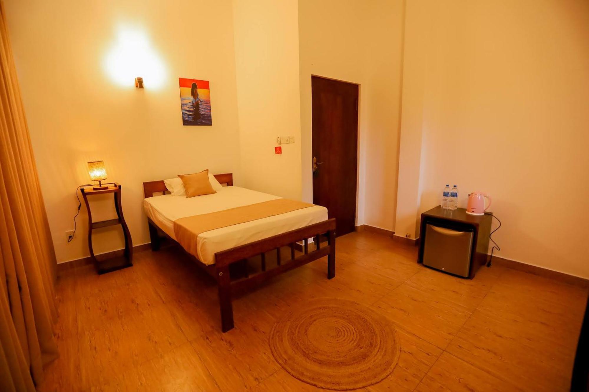 Nibbana Mirissa Hotel Værelse billede